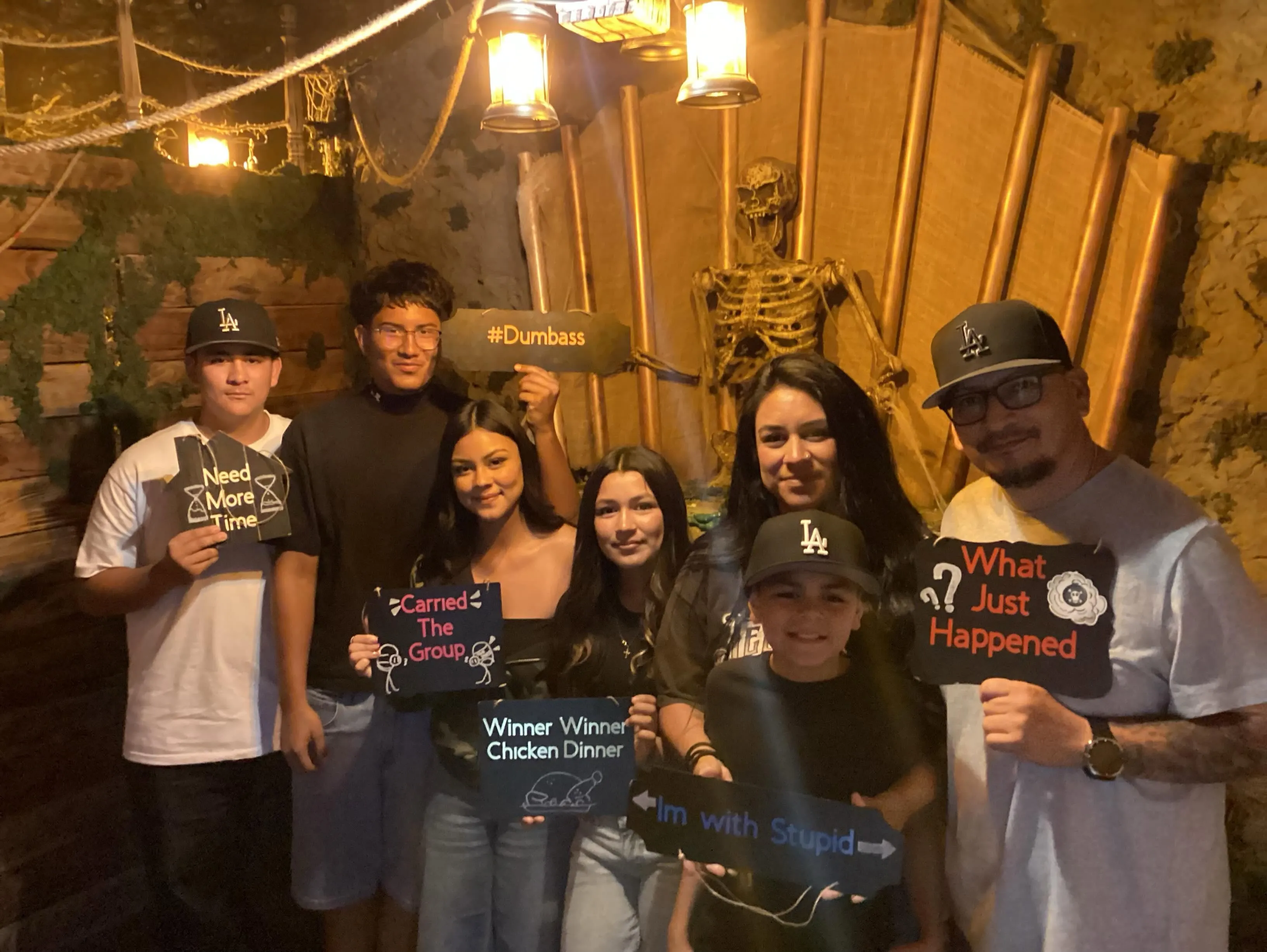 Group celebrating after escaping a room at Journey Escape Rooms Fontana
